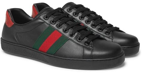 black mens gucci shoes|black Gucci sneakers men's.